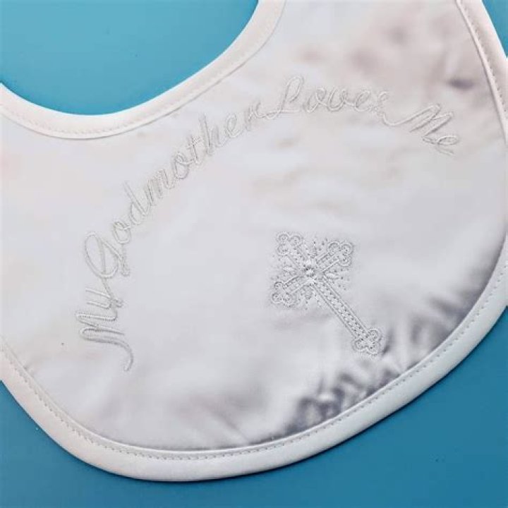 Satin Embroidered Bib with Cross and Shirred Lace Trim — Blessed Celebration