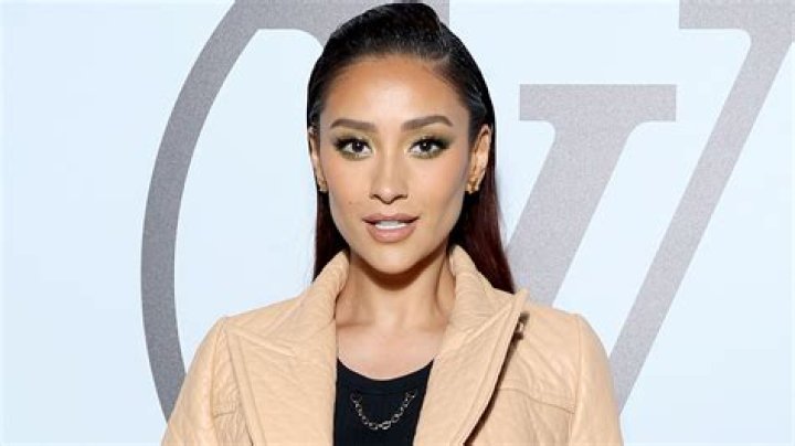 What company does Shay Mitchell own?